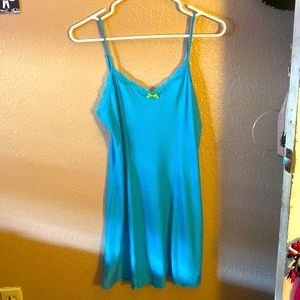 Cute blue maxi dress with yellow polkadots. With a tiny green bow